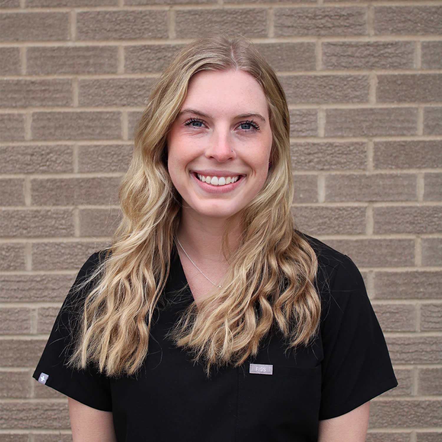 Kaelee, laser liaison at Squires Chiropractic in Ludington